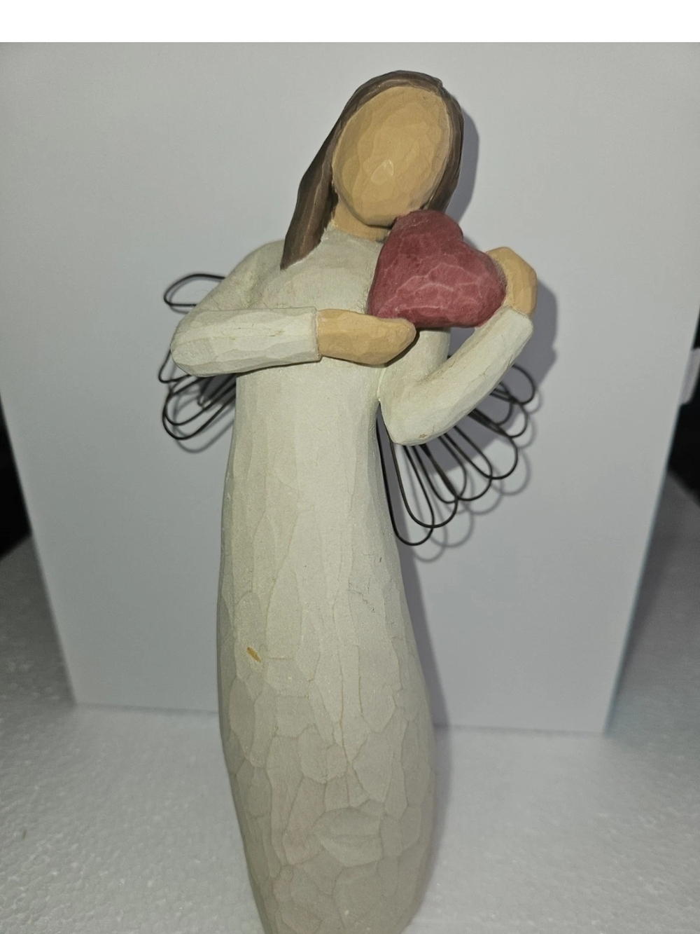 This figurine is a "Hero"  Willow Tree collection,  by artist Susan Lordi.
